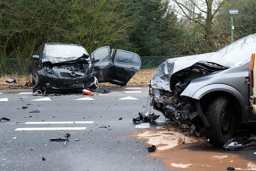 car crash with two heavily damaged vehicles